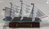 Vintage Highly Detailed HMS Surprise British Flagged Captured French Naval Tall Ship with Small Skiff Life Boat Sail Boat in 10 1/4" Long Glass Bottle