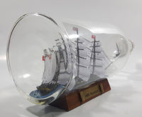 Vintage Highly Detailed HMS Surprise British Flagged Captured French Naval Tall Ship with Small Skiff Life Boat Sail Boat in 10 1/4" Long Glass Bottle