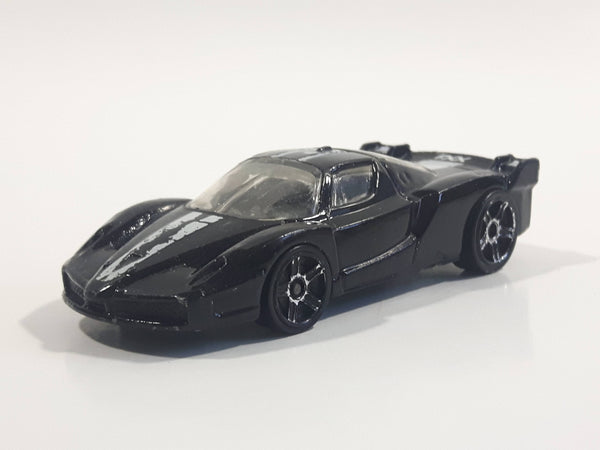 2008 Hot Wheels Ferrari FXX Black with White Stripe Die Cast Toy Dream Car Vehicle