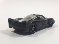 2008 Hot Wheels Ferrari FXX Black with White Stripe Die Cast Toy Dream Car Vehicle