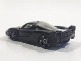 2008 Hot Wheels Ferrari FXX Black with White Stripe Die Cast Toy Dream Car Vehicle