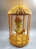 1998 Play By Play Warner Bros. Looney Tunes Tweety Bird Stuffed Plushy on Swing Singing and Talking in 13" Tall Plastic Yellow Cage - Not Working