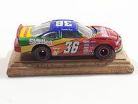 Racing Champions Premier Gold Limited Edition 2318 of 4600 NASCAR #35 Skittles Starburst Die Cast Toy Race Car Vehicle