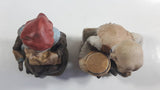 Old Man Sitting With Keg Barrel and Beer Stein and Old Woman Sitting with Umbrella and Packages Porcelain Figurines Set of 2