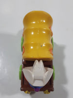 1987 Playskool Muppets Sesame Street Cowboy Grover Chuck Wagon Yellow and Brown Die Cast Toy Car Vehicle