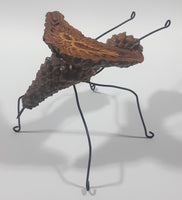 Yukon Mosquito Pine Cone and Wood Art Figure 5 1/4" Long