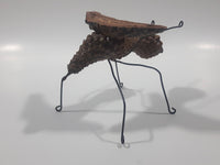 Yukon Mosquito Pine Cone and Wood Art Figure 5 1/4" Long