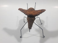 Yukon Mosquito Pine Cone and Wood Art Figure 5 1/4" Long