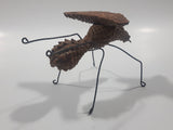 Yukon Mosquito Pine Cone and Wood Art Figure 5 1/4" Long