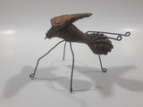 Yukon Mosquito Pine Cone and Wood Art Figure 5 1/4" Long