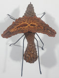 Yukon Mosquito Pine Cone and Wood Art Figure 5 1/4" Long