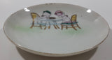 Vintage Occupied Japan Style Chubby Male and Female Nude Naked Cherub Like Characters Sitting At A Table 4 1/4" Diameter Hand Painted Porcelain Plate