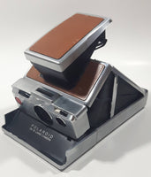 Vintage Polaroid SX-70 Land Camera with ITT Magic Flash