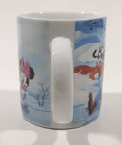 Enesco Disney Mickey Mouse, Minnie Mouse, Goofy, and Pluto Winter Scene Ice Skating on A Pond 3 3/4" Tall Ceramic Coffee Mug Cup