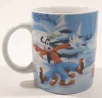 Enesco Disney Mickey Mouse, Minnie Mouse, Goofy, and Pluto Winter Scene Ice Skating on A Pond 3 3/4" Tall Ceramic Coffee Mug Cup