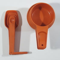 Vintage Tupperware Orange Measure Cups and Spoons Set