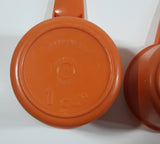 Vintage Tupperware Orange Measure Cups and Spoons Set