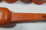 Vintage Tupperware Orange Measure Cups and Spoons Set