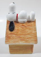 Peanuts Snoopy Laying On His Doghouse 5" Tall Ceramic Coin Bank
