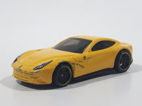 2014 Hot Wheels HW City - Speed Team Ferrari F12 Berlinetta Yellow Die Cast Toy Car Vehicle