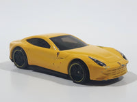 2014 Hot Wheels HW City - Speed Team Ferrari F12 Berlinetta Yellow Die Cast Toy Car Vehicle