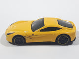 2014 Hot Wheels HW City - Speed Team Ferrari F12 Berlinetta Yellow Die Cast Toy Car Vehicle