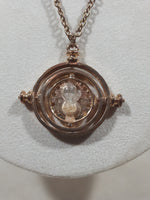 Rotating Pivoting Hour Glass Gold Tone Metal Pendant 20" Long Necklace