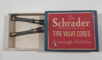 Antique 1930s Schrader Tire Valve Cores Box with Two Valves left