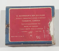 Antique 1930s Schrader Tire Valve Cores Box with Two Valves left