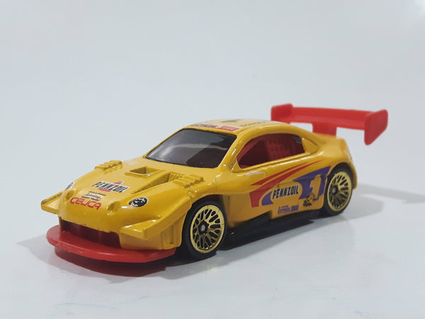 1998 Hot Wheels First Editions Pikes Peak Celica Pennzoil Express Lube 1 No Fear Yellow Die Cast Toy Race Car Vehicle