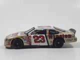 Action Racing Team Caliber Team Winston Limited Edition 1 of 10,080 NASCAR #23 Jimmy Spencer 1999 Ford Taurus No Bull Food City Gold and White Die Cast Race Car Vehicle