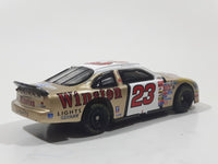 Action Racing Team Caliber Team Winston Limited Edition 1 of 10,080 NASCAR #23 Jimmy Spencer 1999 Ford Taurus No Bull Food City Gold and White Die Cast Race Car Vehicle