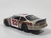 Action Racing Team Caliber Team Winston Limited Edition 1 of 10,080 NASCAR #23 Jimmy Spencer 1999 Ford Taurus No Bull Food City Gold and White Die Cast Race Car Vehicle