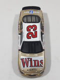 Action Racing Team Caliber Team Winston Limited Edition 1 of 10,080 NASCAR #23 Jimmy Spencer 1999 Ford Taurus No Bull Food City Gold and White Die Cast Race Car Vehicle