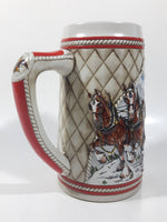 1985 Budweiser Holiday Stein Collection "A" Series "The hitch journeying through snow-capped mountains on a crisp winter's morn." 6 3/8" Tall Ceramic Beer Stein Mug