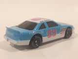 1991 Racing Champions NASCAR #89 Jim Sauter Evinrude Outboard Blue and White Die Cast Toy Car Vehicle