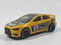 2019 Hot Wheels Backroad Rally 2008 Lancer Evolution Yellow Die Cast Toy Car Vehicle