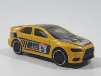 2019 Hot Wheels Backroad Rally 2008 Lancer Evolution Yellow Die Cast Toy Car Vehicle