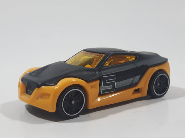 2014 Hot Wheels Ultimate Racing Symbolic Black and Orange #5 Die Cast Toy Car Vehicle