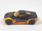 2014 Hot Wheels Ultimate Racing Symbolic Black and Orange #5 Die Cast Toy Car Vehicle