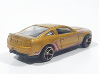 2011 Hot Wheels Faster Than Ever 2010 Ford Mustang GT Metalflake Gold Die Cast Toy Car Vehicle