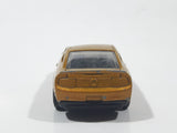 2011 Hot Wheels Faster Than Ever 2010 Ford Mustang GT Metalflake Gold Die Cast Toy Car Vehicle