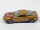 2011 Hot Wheels Faster Than Ever 2010 Ford Mustang GT Metalflake Gold Die Cast Toy Car Vehicle