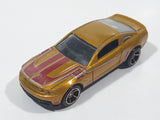 2011 Hot Wheels Faster Than Ever 2010 Ford Mustang GT Metalflake Gold Die Cast Toy Car Vehicle