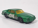 2010 Hot Wheels Race World Movie Stunts '84 Pontiac Grand Prix Metallic Green Die Cast Toy Car Vehicle