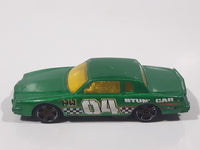 2010 Hot Wheels Race World Movie Stunts '84 Pontiac Grand Prix Metallic Green Die Cast Toy Car Vehicle