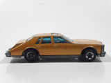 Vintage 1983 Hot Wheels Cadillac Seville Metalflake Gold Die Cast Toy Car Vehicle