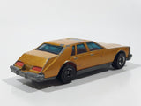 Vintage 1983 Hot Wheels Cadillac Seville Metalflake Gold Die Cast Toy Car Vehicle