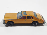 Vintage 1983 Hot Wheels Cadillac Seville Metalflake Gold Die Cast Toy Car Vehicle