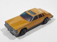 Vintage 1983 Hot Wheels Cadillac Seville Metalflake Gold Die Cast Toy Car Vehicle